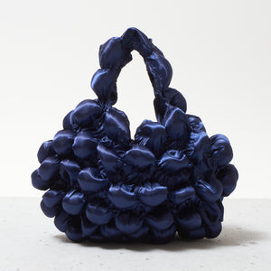 大きなぽんぽんのバッグ サテン