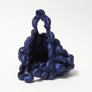 大きなぽんぽんのバッグ サテン