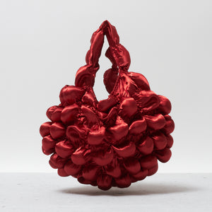 大きなぽんぽんのバッグ サテン