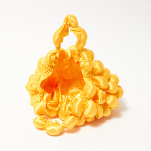 大きなぽんぽんのバッグ サテン