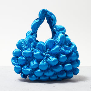 大きなぽんぽんのバッグ サテン