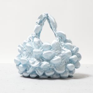 大きなぽんぽんのバッグ サテン