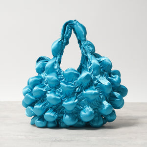 大きなぽんぽんのバッグ サテン