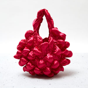 大きなぽんぽんのバッグ サテン