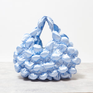 大きなぽんぽんのバッグ サテン